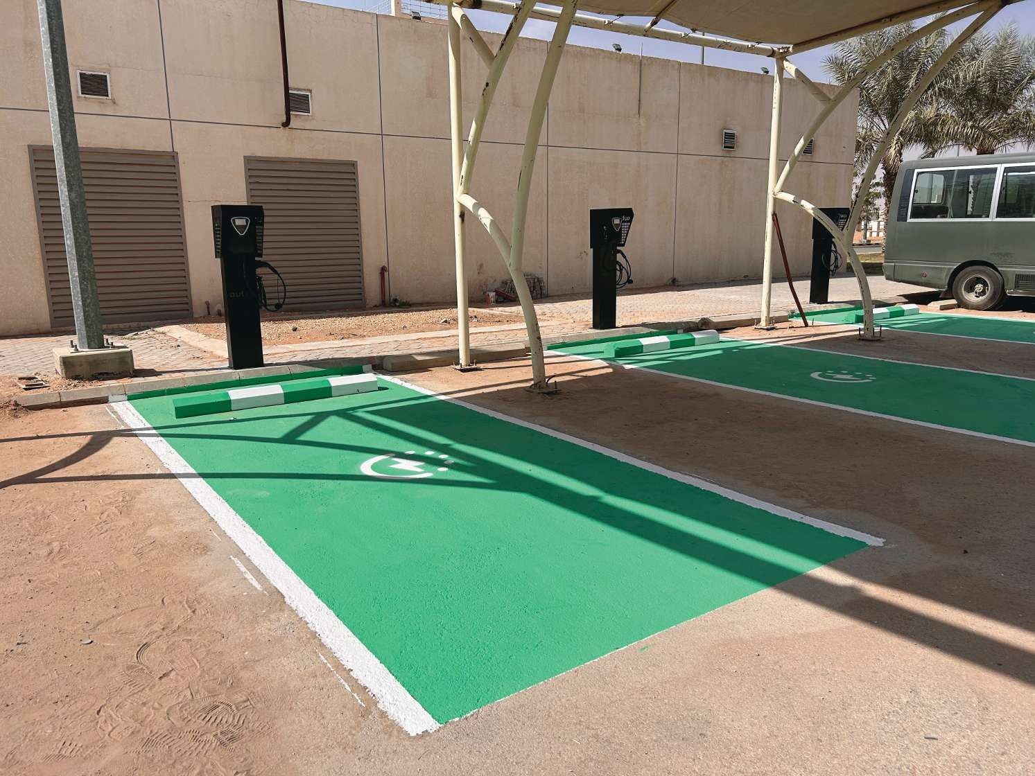 AC chargers in green parking bays