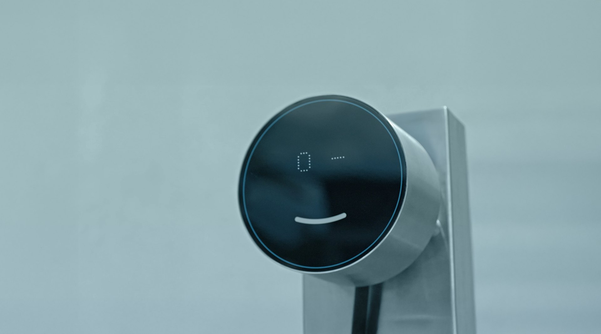 Close-up of a Voltie charger and its smiling face